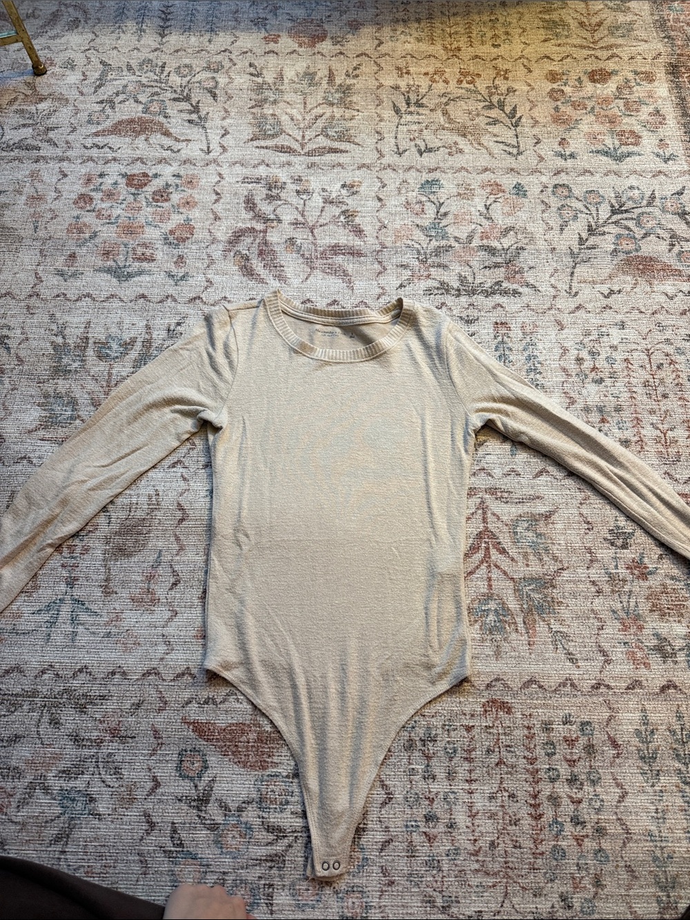 Long Sleeve One-Piece Bodysuit in Cream